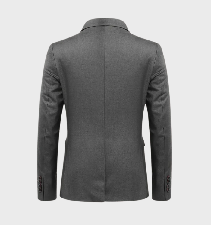 3-delige herenblazer met revers en enkele borstzak in combinatie met een broek met zakken